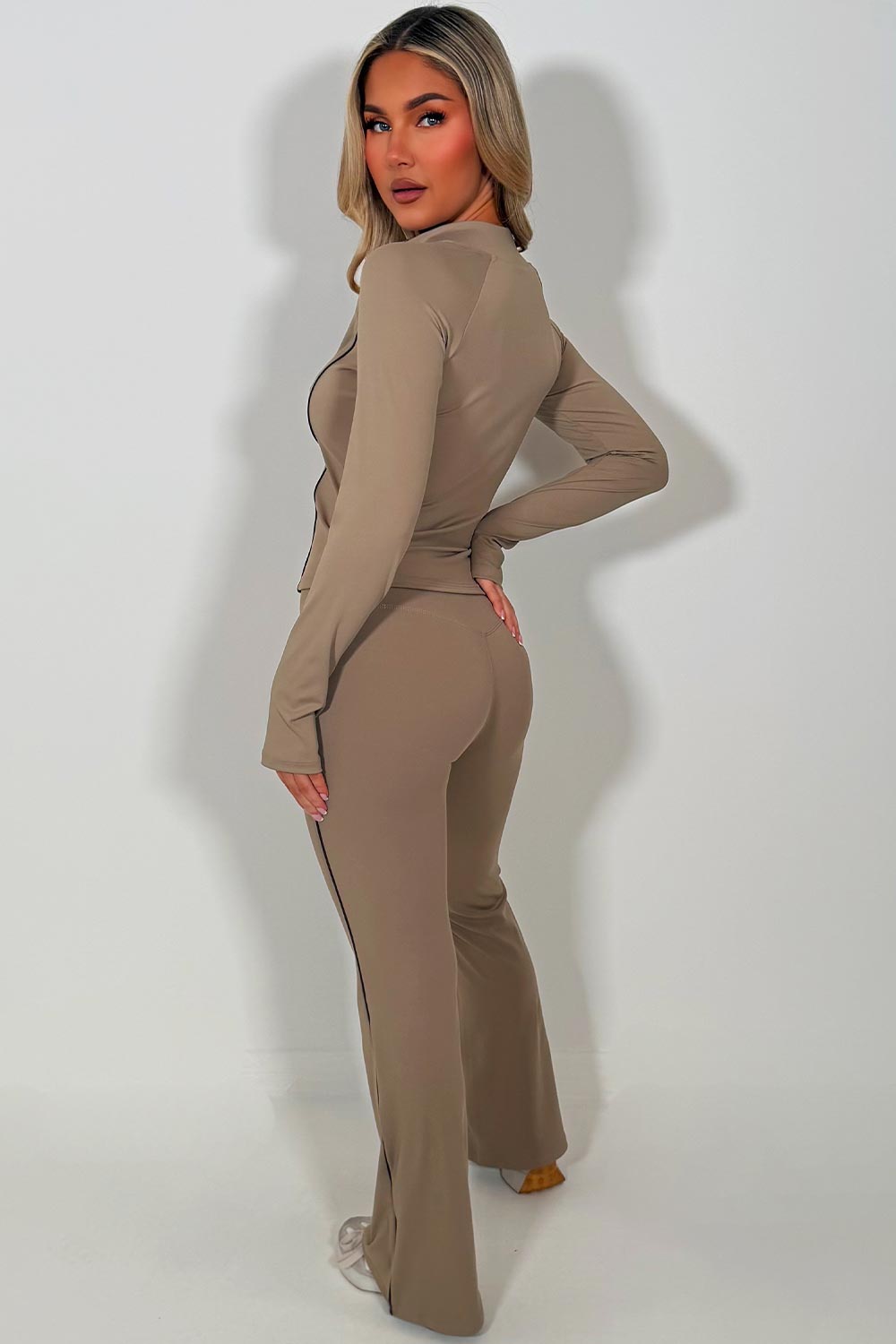 zip up sports jacket and scrunch bum flare pants two piece set matching outfit gym activewear styledup