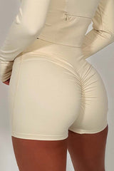 gym shorts and half zip top two piece set alo yoga women