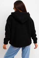 black teddy bear half zip sweatshirt styled up 