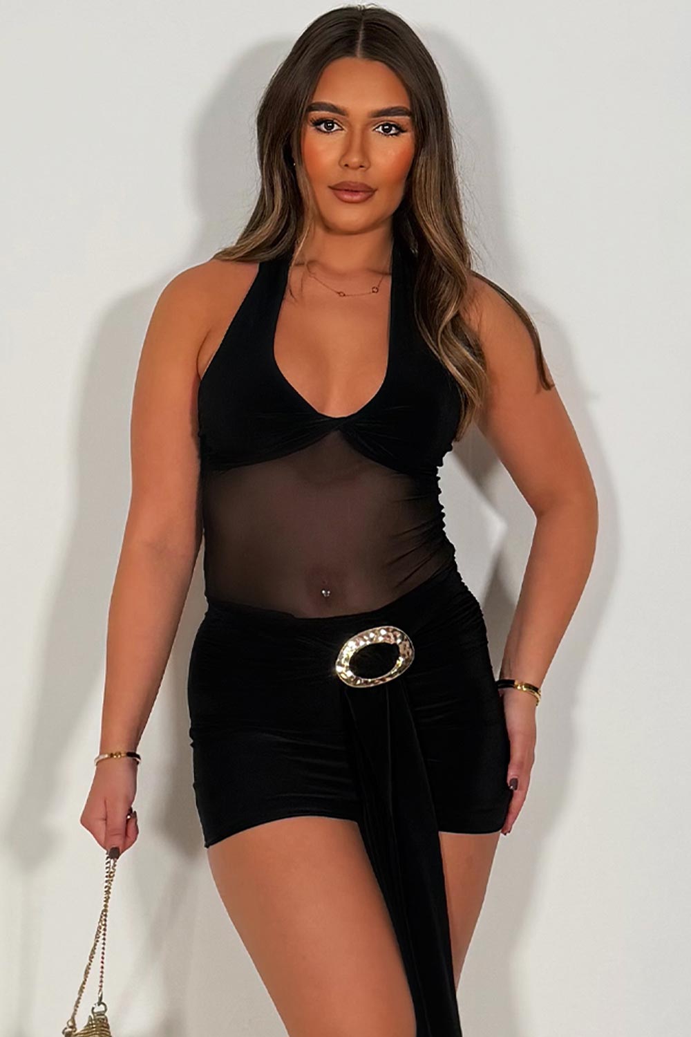 black halter neck mini dress with buckle and drape detail on the front christmas party new years eve outfit  