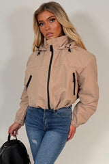 womens beige hooded padded rain jacket for festival styledup uk