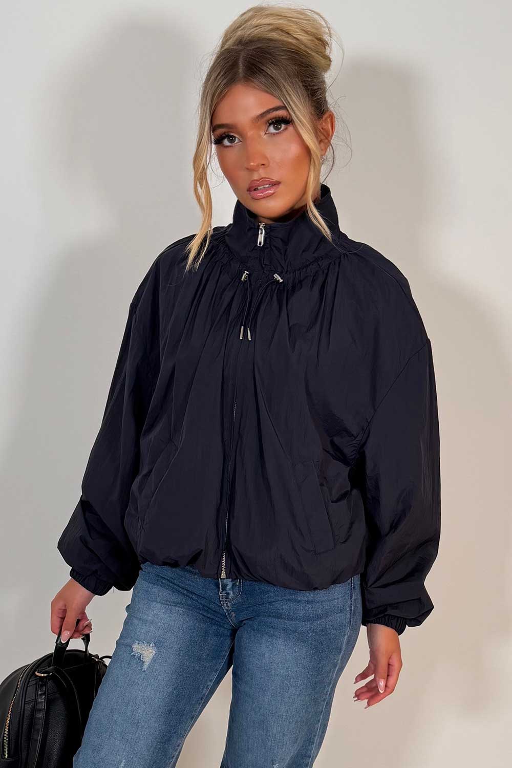 navy funnel neck jacket with cinched waist womens transitional autumn winter windbreaker jacket uk styledup