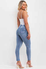 high waisted light wash denim skinny jeans