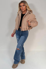 womens beige padded jacket with hood weather resistant