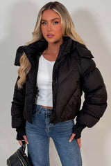 womens black puffer padded crop winter jacket with thumb holes styledup uk