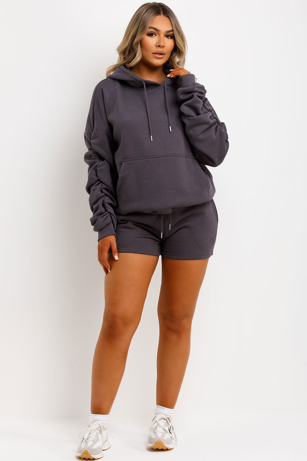 womens oversized ruched sleeve hoodie and shorts lounge set airport outfit