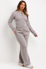 dove grey zip up corset crop sweatshirt and joggers tracksuit travelling airport outfit styledup