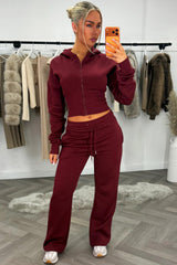 womens crop corset cinched waist hoodie and joggers tracksuit set airport outfit burgundy styledup