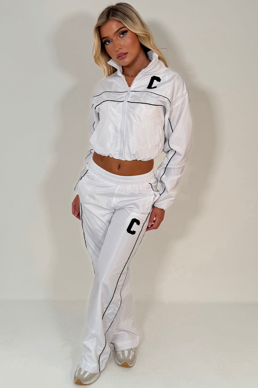 crop jacket and track trousers holiday outfit for womens styledup 