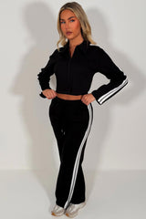 womens black crop sweatshirt and wide leg joggers tracksuit with side stripes airport outfit casual everyday outfit styledup uk white fox