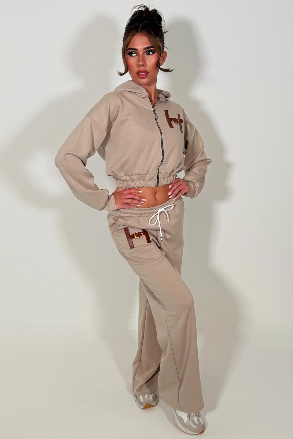 crop hoodie and wide leg jogger tracksuit co ord with letter H detail womens casual lounge set 