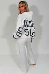 womens hoodie and joggers two piece loungewear co ord couture club set styledup fashion airport outfit 
