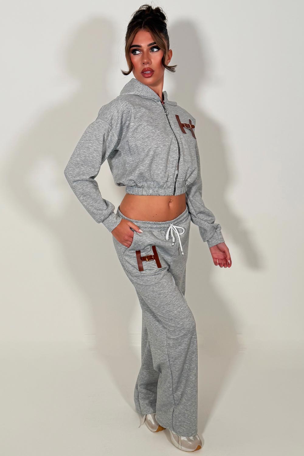 crop hoodie and wide leg jogger tracksuit co ord with letter H detail womens casual lounge set 