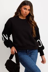 knitted sleeve love slogan jumper black