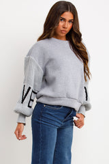 womens jumper with love slogan and knitted sleeves styledup