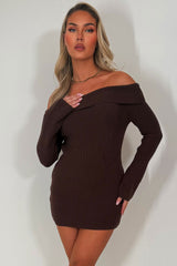 knitted jumper dress with long sleeves and off shoulder neckline styledup christmas party outfit 