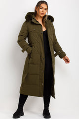 womens long coat with fur hood and belt styled up