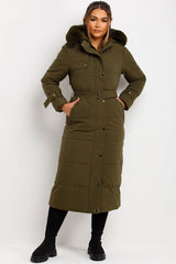 womens longline puffer coat with fur hood and belt for winter