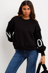 winter jumper with love slogan knitted sleeves styledup