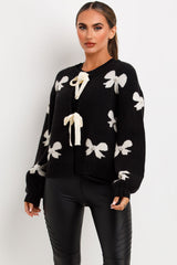 womens knitted jumper with bows and diamante detail