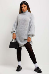 jumper dress with roll neck and long puff sleeves