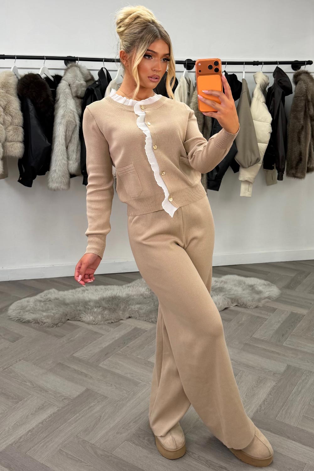womens knitted wide leg trousers and jumper top with gold button detail night out Christmas party occasion outfit for winter uk