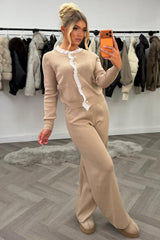 womens knitted wide leg trousers and jumper top with gold button detail night out Christmas party occasion outfit for winter uk