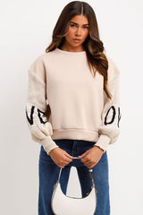 womens jumper with knitted sleeves love slogan styledup