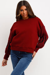 womens winter jumper sweatshirt with knitted sleeves love slogan styled up