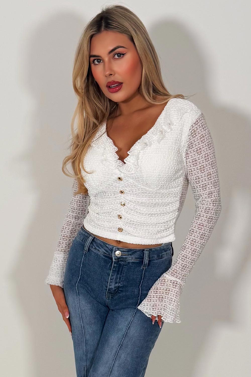 frilly ruffle hem long sleeve crop top with gold buttons summer holiday clothes styledup fashion uk