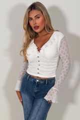 frilly ruffle hem long sleeve crop top with gold buttons summer holiday clothes styledup fashion uk