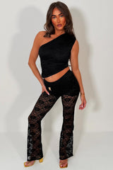 black lace flared leg trousers and one shoulder top two piece co ord set for womens festival outfit styledup
