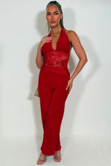 plunge halter neck backless wide leg jumpsuit with lace insert styledup 