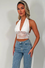 plunging halter neck crop top with lace hem styledup