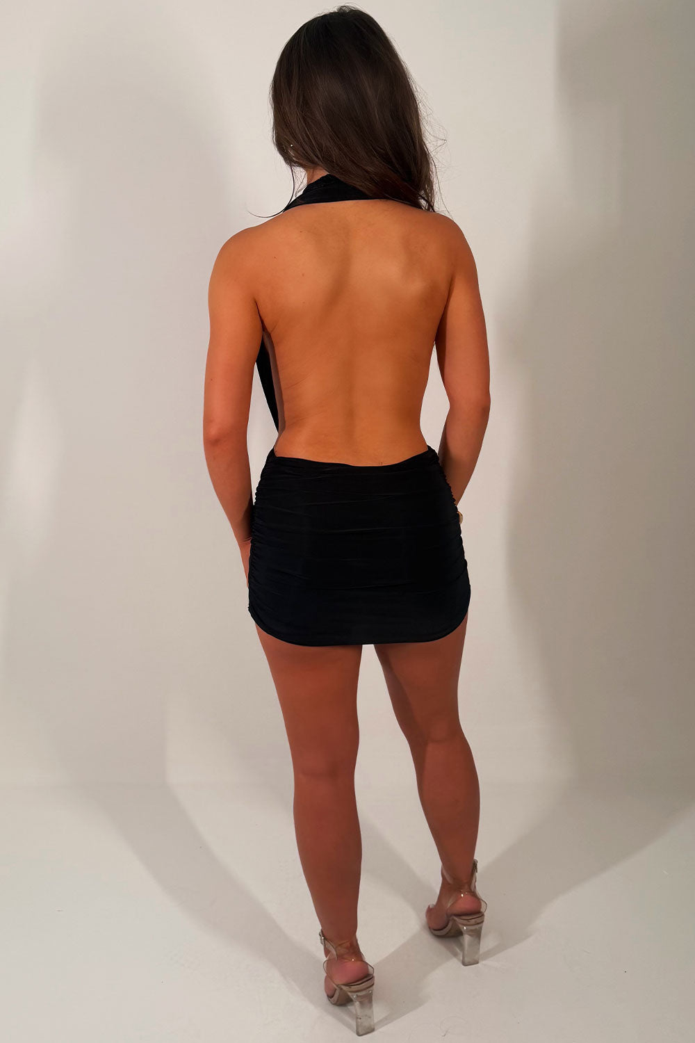 black mini dress with plunging neckline and backless styledup uk