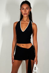 halterneck top with crochet trim and mini drape skirt co rod set black