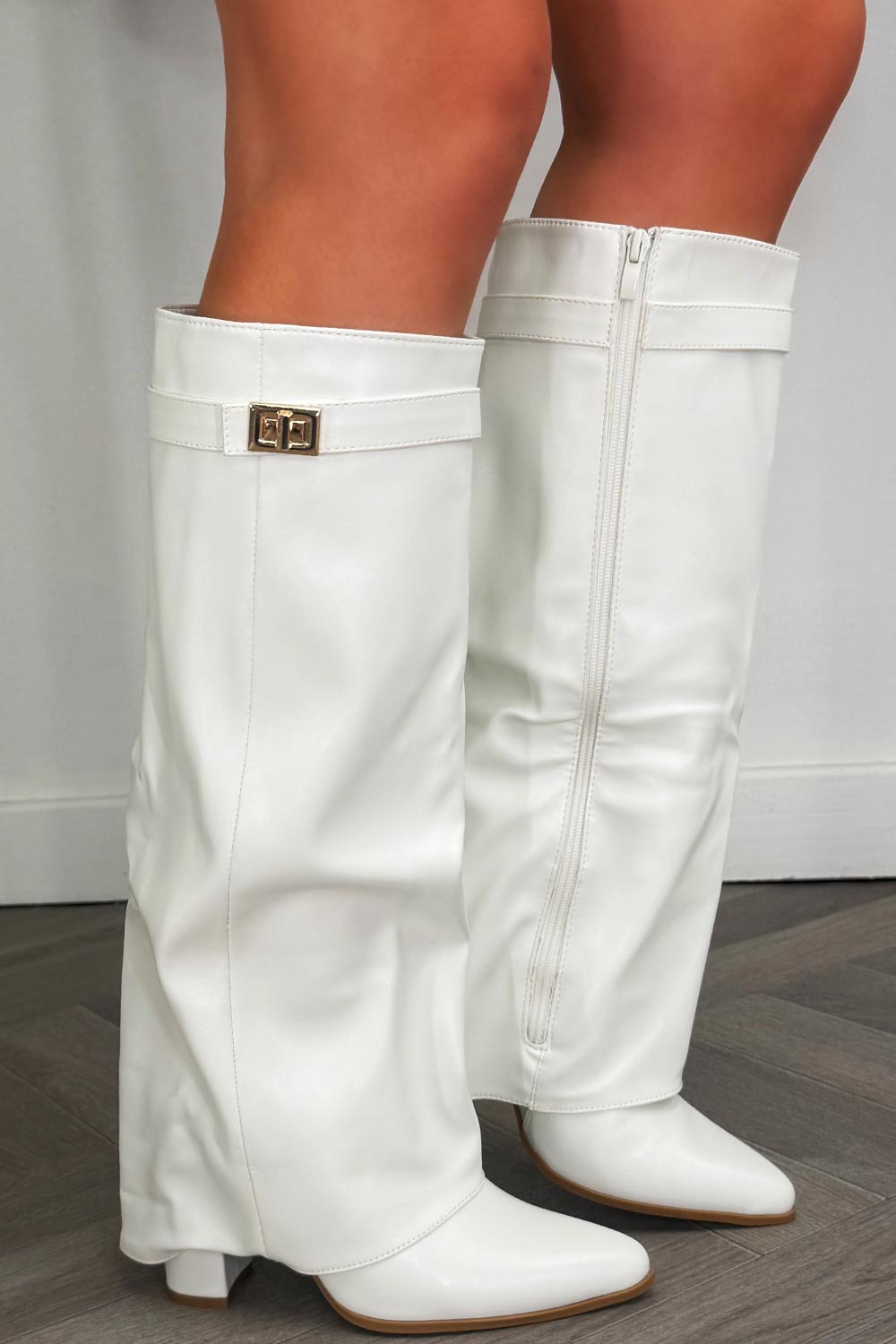 white knee high cowboy boots with side zip and gold buckle 