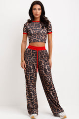 leopard print ribbed trousers and top loungewear set holiday airport travel outfit