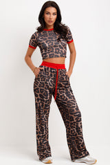 leopard print ribbed wide leg trousers and crop top co ord loungewear set airport outfit