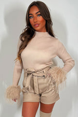 womens jumper with long sleeves and faux fur cuff christmas party outfit styledup