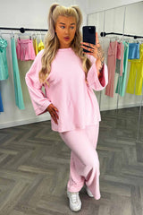 baby pink ribbed oversized drop shoulder long sleeve top and wide leg trousers two piece loungewear set