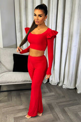 going out christmas party outfit red long sleeve crop top and trousers co ord set