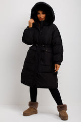 long puffer jacket with fur hood and drawstring waist