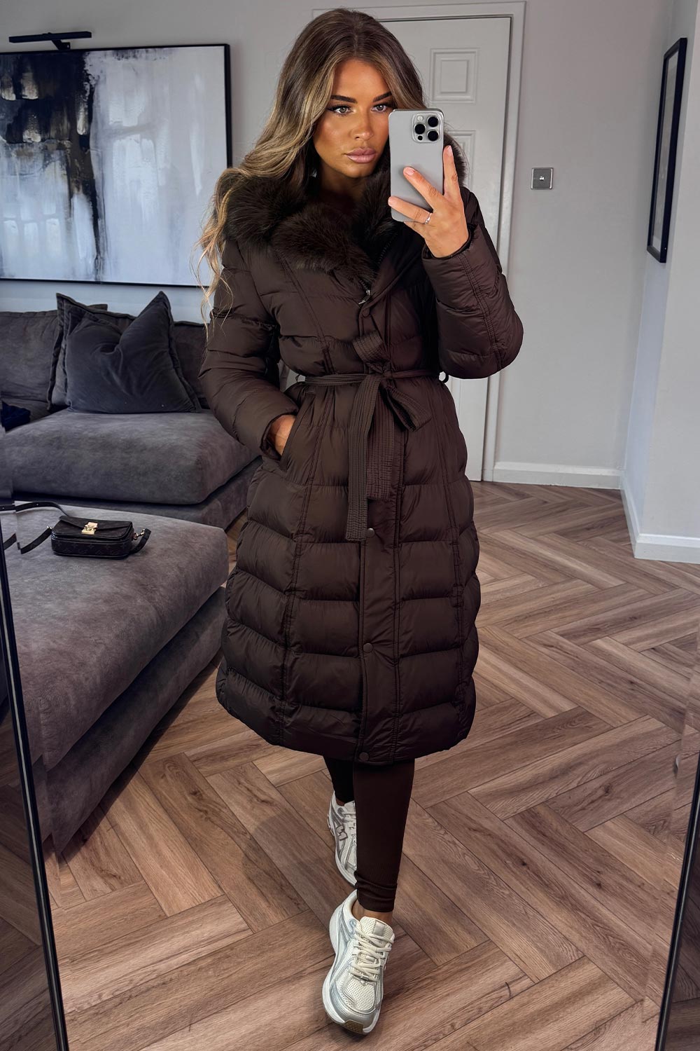 womens hooded padded long puffer coat with faux fur hood and belt styledup uk