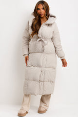 womens long puffer padded coat with hood and belt styledup