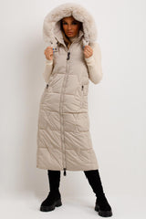womens long puffer gilet with faux fur hood quilted sleeveless jacket