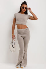 beige fold over hem skinny flare trousers and crop top co ord set casual outfit womens