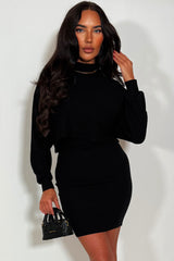 black knitted jumper dress with long batwing sleeves two piece christmas party outfit styledup