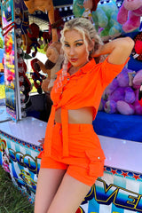 neon orange crop top and shorts co ord festival rave outfit