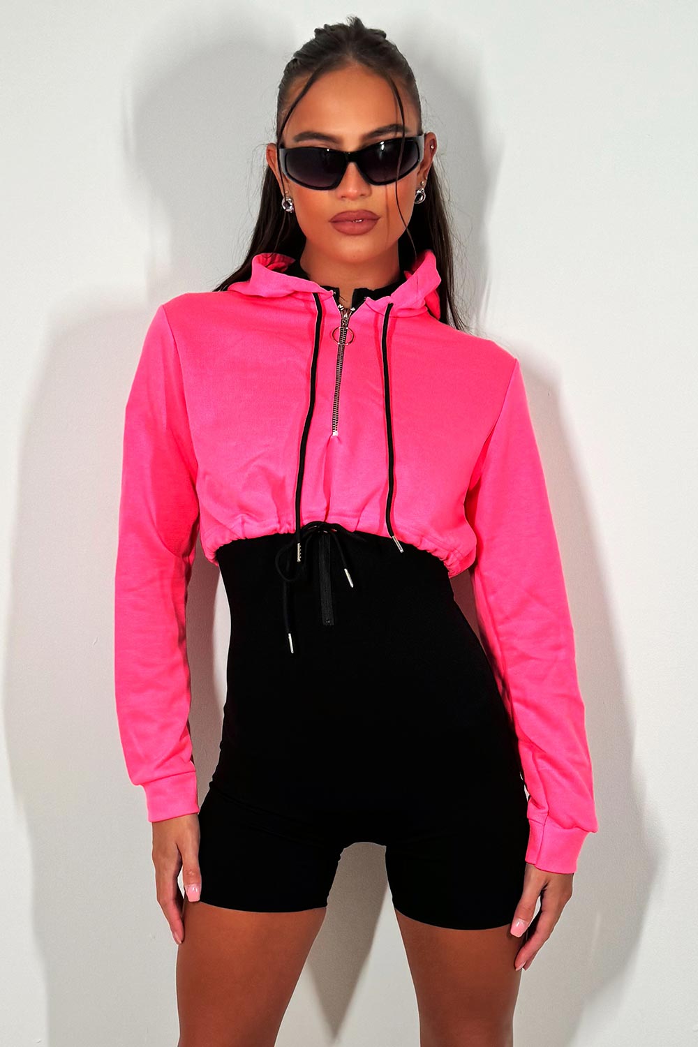 neon pink crop sweatshirt with half zip and drawstring rave festival top